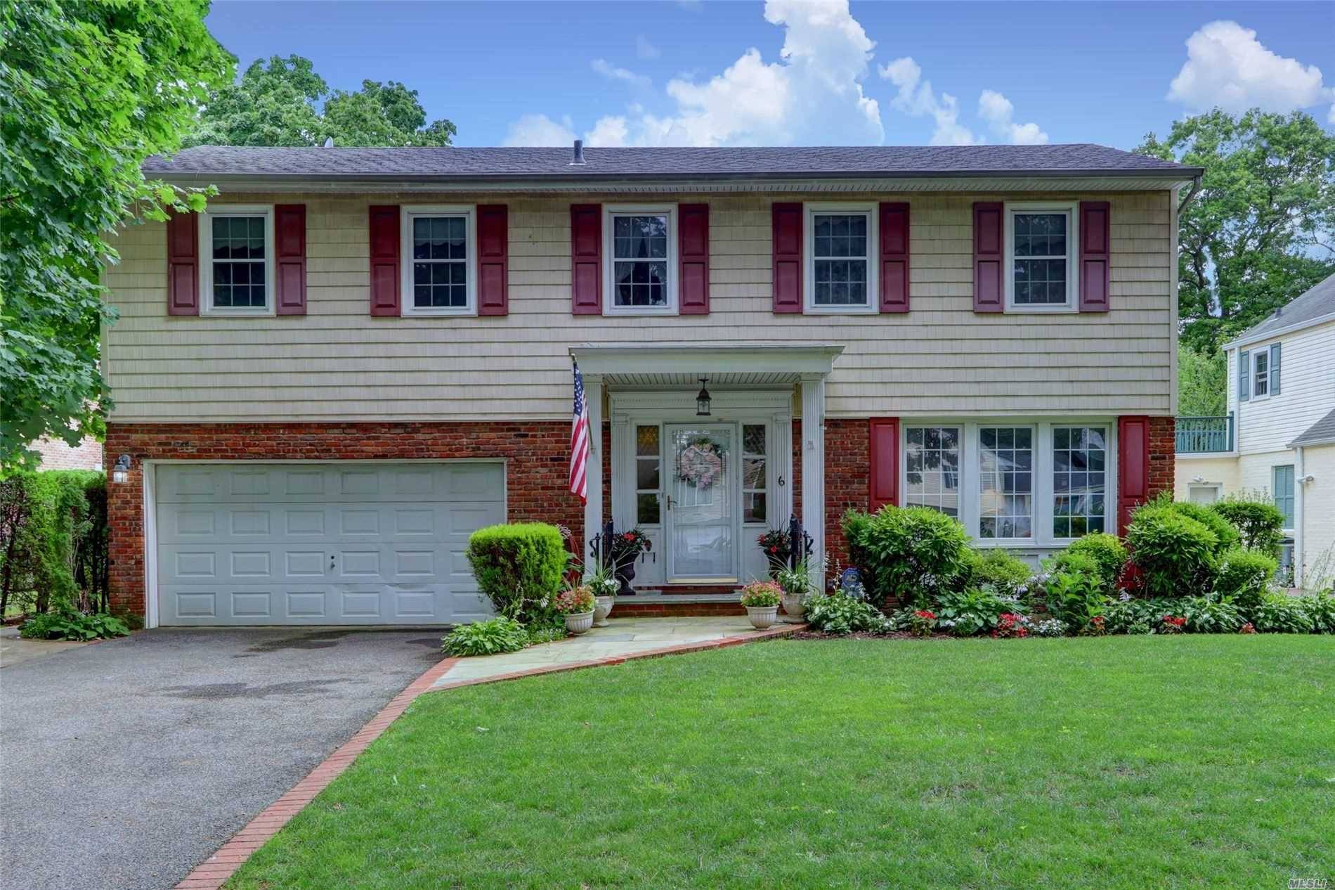 Spacious 5 Bedroom 2. 5 bath colonial with Master Suite, first floor laundry and nicely laid out first level.