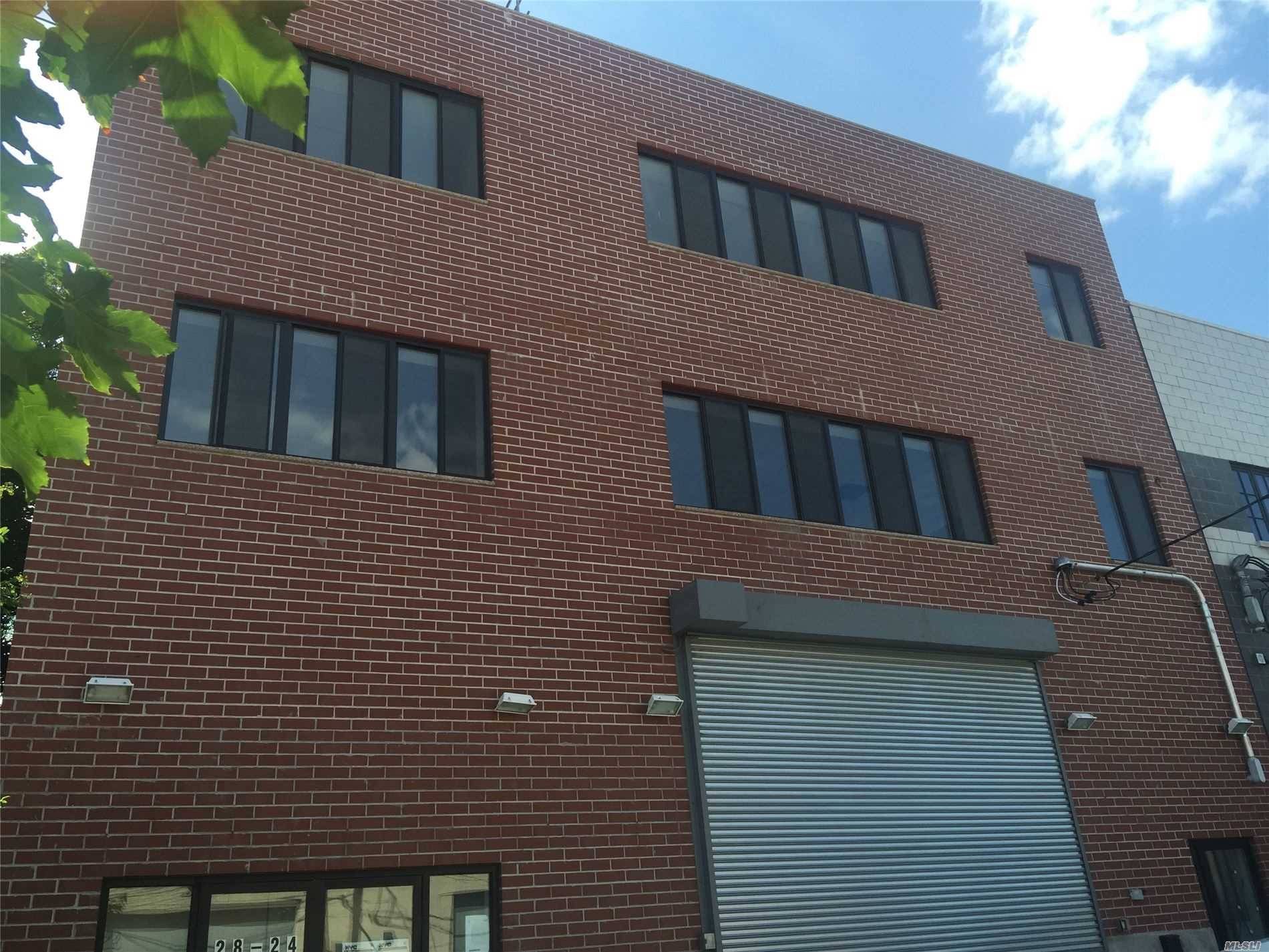 Brand New 2018 3 Storey Brick Building With Parking Lot.
