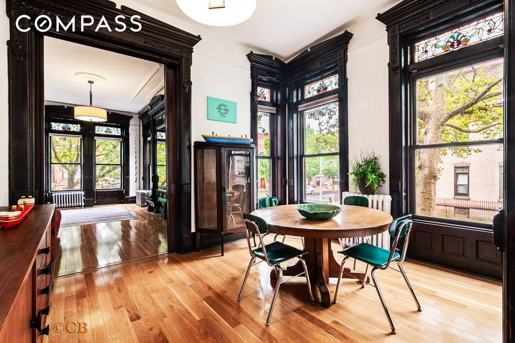 Absolutely magnificent and totally unique Bedford Stuyvesant, four story three family CORNER mansion, located on one of the best blocks in Bed Stuy.