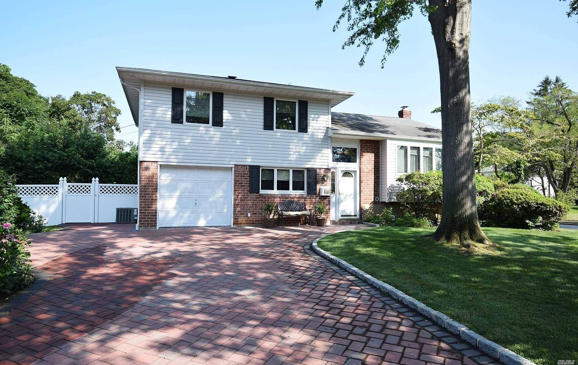 Immaculate Clean Split Home in Quiet Location, Move in Ready, Mostly Renovated 2010, New Eik Sliders to outside Deck, New Baths, Beautiful New Hardwood Floors, Andersen Windows, CAC, New Brick ...