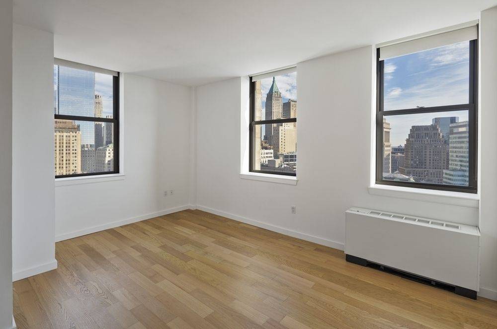 Luxury 1 Bed in Financial District w/ High Ceilings and City Views - No Fee*