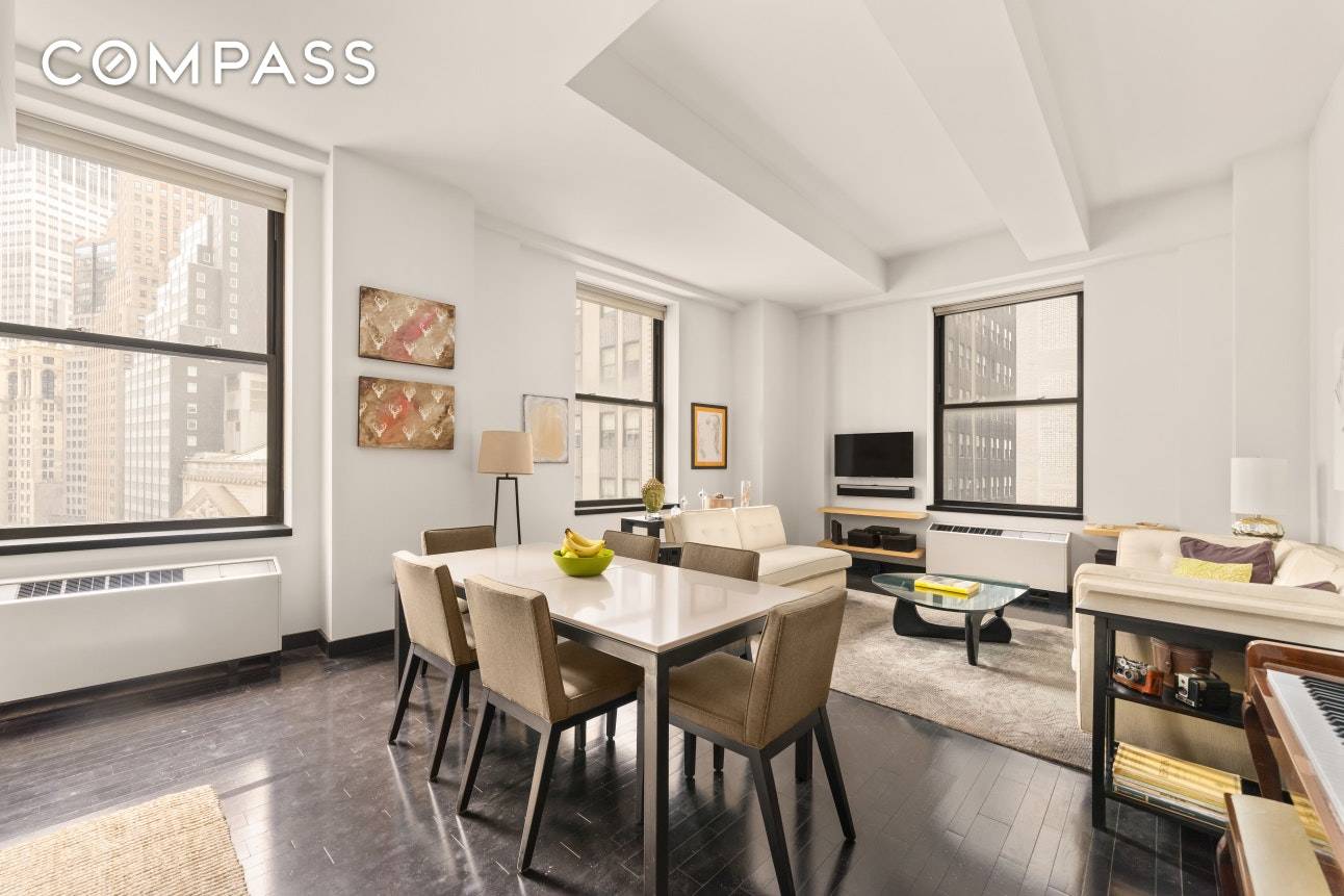 MASSIVE SOUTH FACING 1 BEDROOM WITH PICTURESQUE VIEWS OF THE STOCK EXCHANGE Large storage cage included Residence 1008 exhibits an enormous, quiet environment with high ceilings.