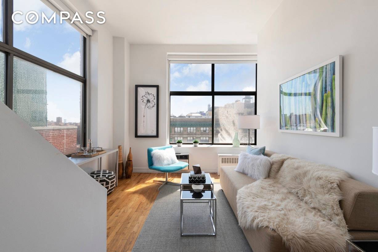 Sunblasted Corner Loft This sky high studio offers two full walls of massive windows boasting open Southern and Eastern views, plus soaring 11 foot ceilings.