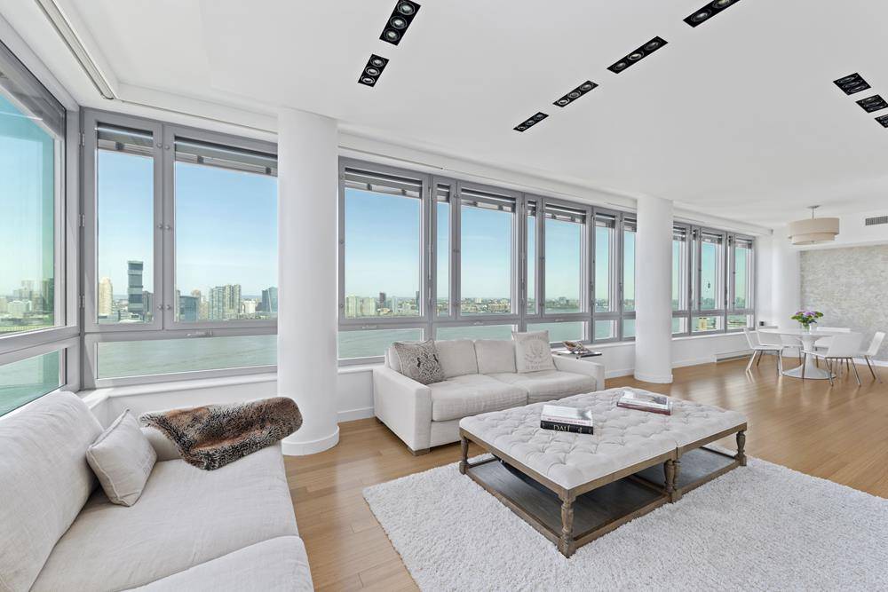 CINEMATIC HUDSON RIVER VIEWS AS FAR AS THE EYE CAN SEE from the Penthouse in one of New York City's Premier LEED certified Green condominiums, the Riverhouse.