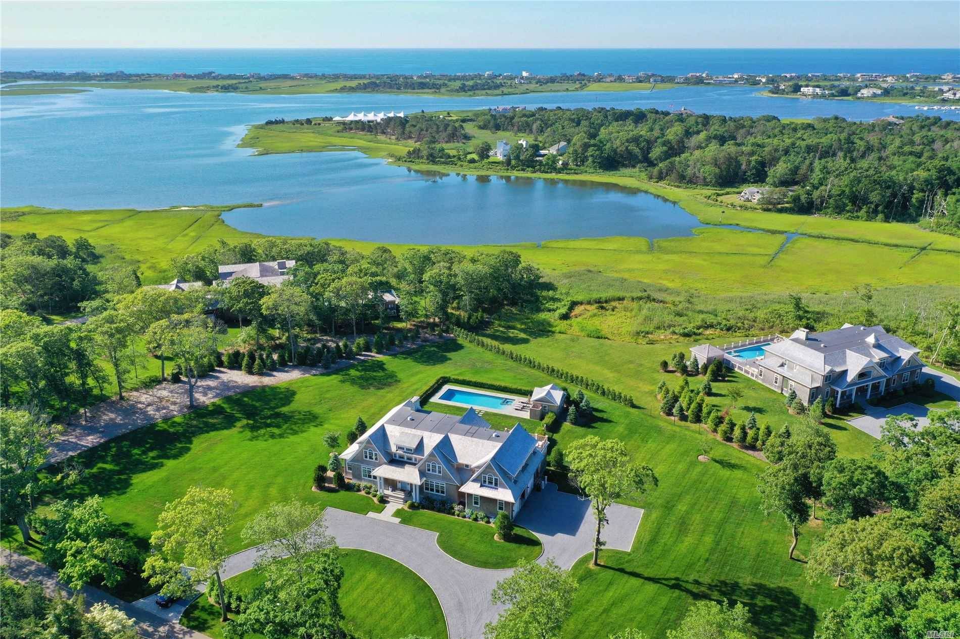 Located on one of the most prestigious roads in Quogue, you find this extraordinary, stunning newly constructed home.