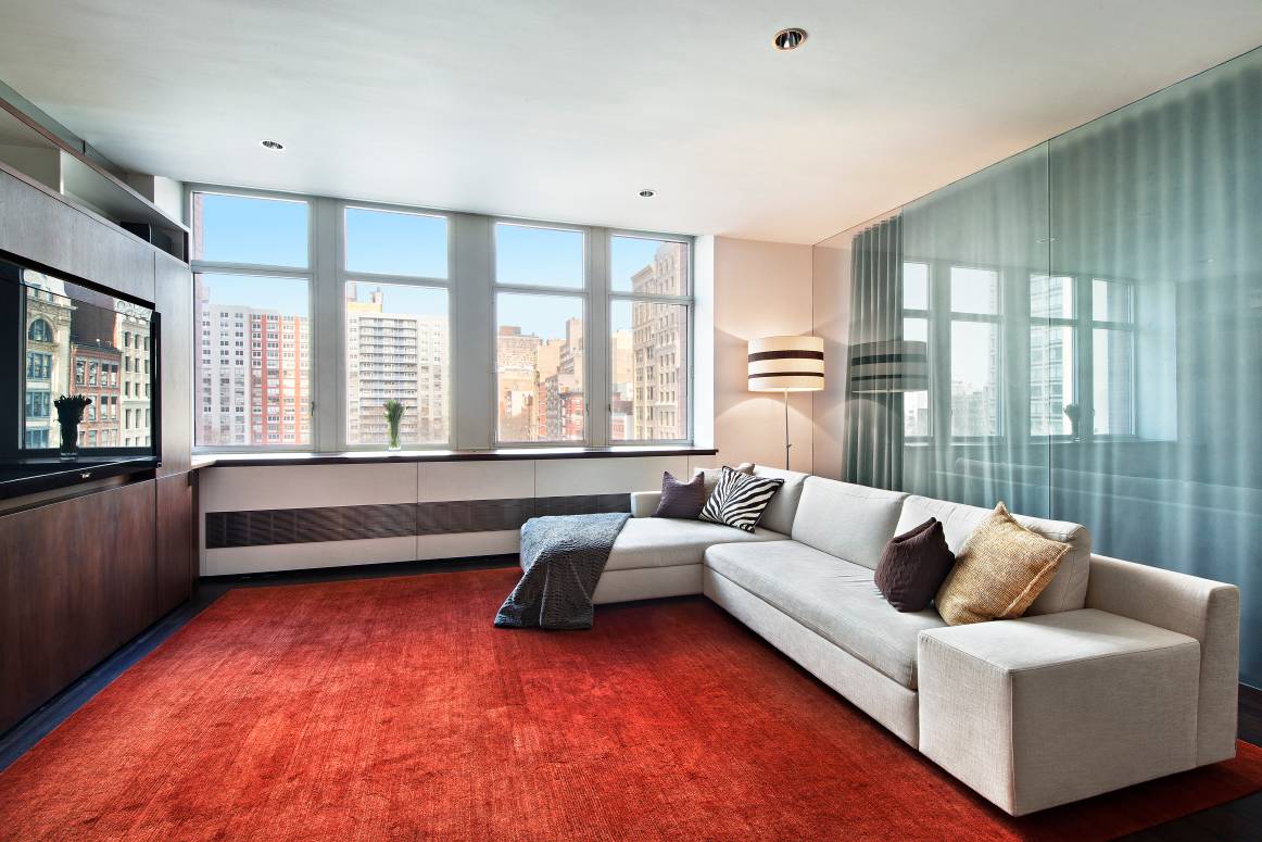Stylish turn key 2Br 2Bth in one of Soho's most coveted doorman condos.