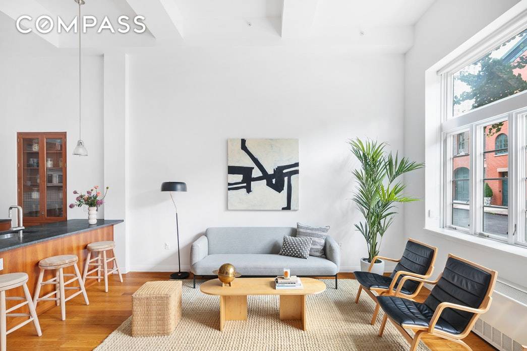 Convertible 2 Bed Deeded Parking Space Located in Brooklyn Heights' most coveted building, step into this nearly 1, 000 square foot home's great room and be greeted by a wall ...