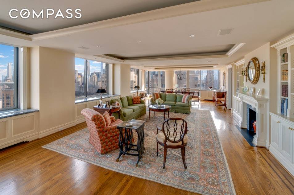 Located on the 36th floor of a luxury condominium with stunning panoramic views over Central Park and the City skyline, this expansive 5 bedroom, 4.