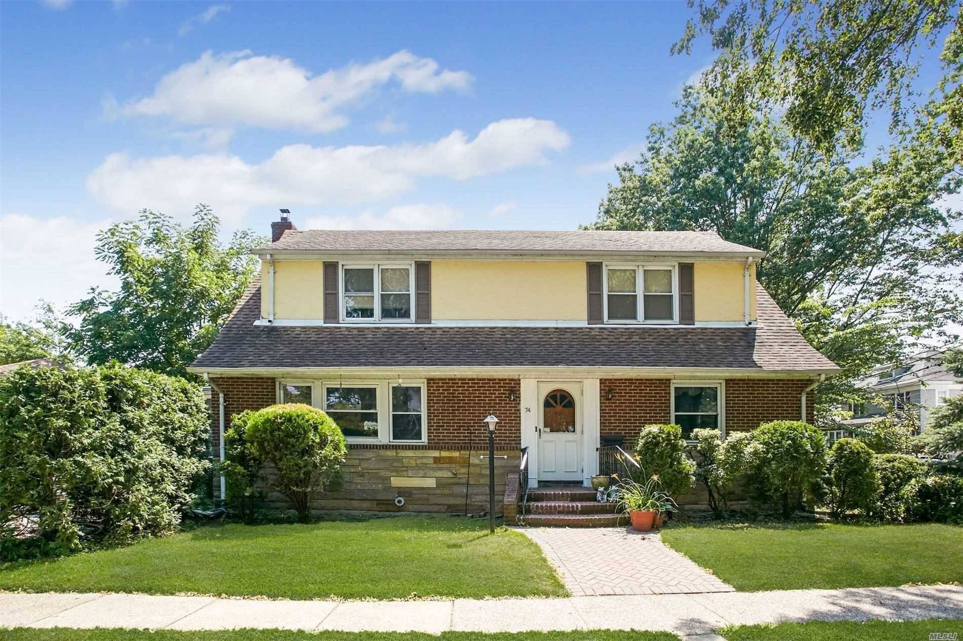 Immaculate Two Family, Brick Cape In The Heart Of The Village Of Floral Park.