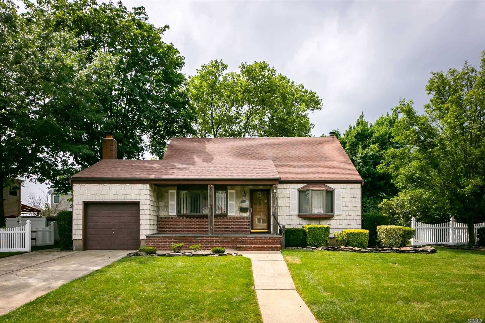 Expanded Cape w front porch, Mid block location, Freshly Painted, Beautiful hardwood floors, CAC, Fireplace, 4 Skylights, Finished Bsmt, oversized property 80 x 100, Brand New Washer Dryer, IGS, Woodward ...