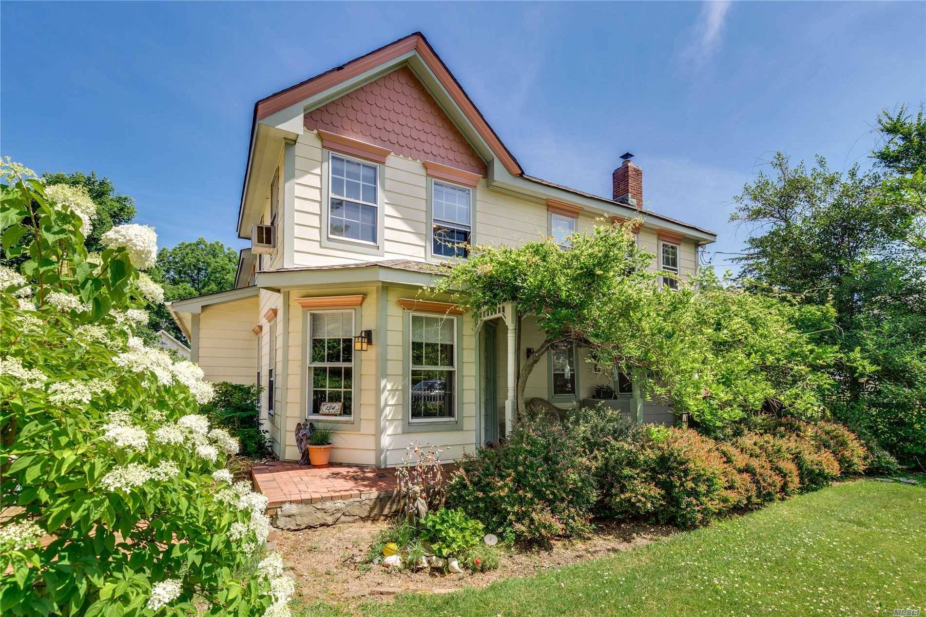 Country living colonial on park like property on quiet SD14 Old Woodmere block.
