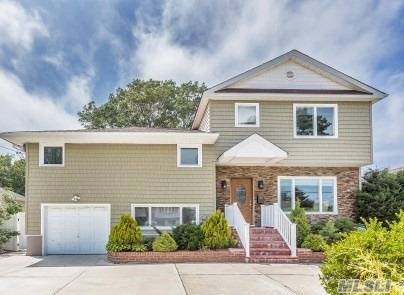 Beautifully totally remodeled, just 3 years ago this expanded split is located in the heart of Massapequa Park Village, SD 23, Spacious floor plan including granite SS Kitchen, 2 dens ...