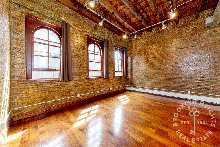 Stunning and lovingly renovated historic 1892 Romanesque Revival carriage house with Colonial Revival details on pretty Brownstone block in Prime Boerum Hill Carroll Gardens area.