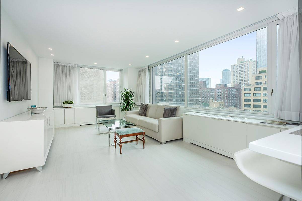 Sunning 19th floor corner unit faces, north and west has custom renovations including flooring, renovated granite kitchen and marble bathroom.