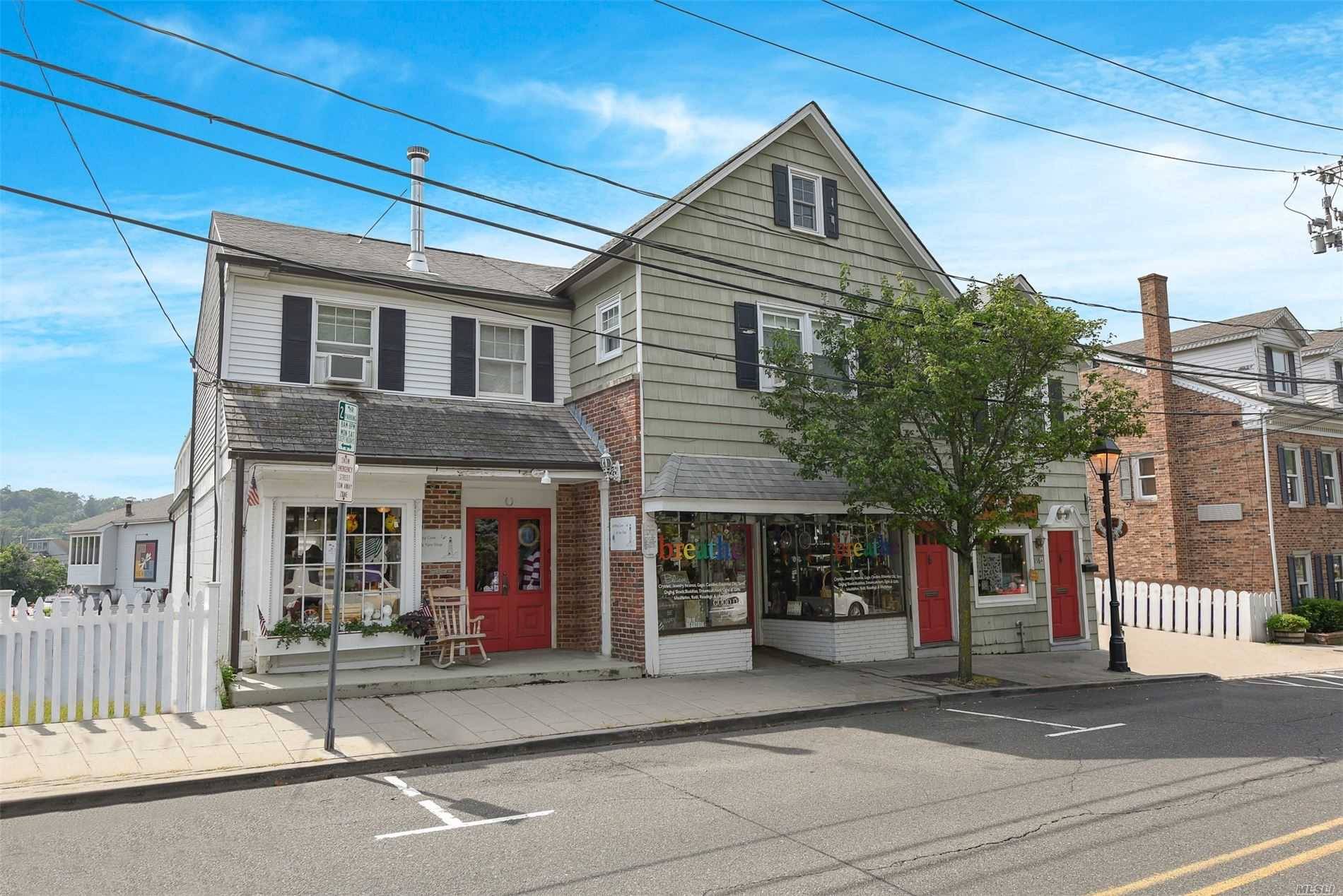 Excellent opportunity to own an income producing free standing building in heart of Port Jefferson Village that includes 3 stores fronts Breathe, Knitting Cove, Luna Nova and 3 apartments Upper ...
