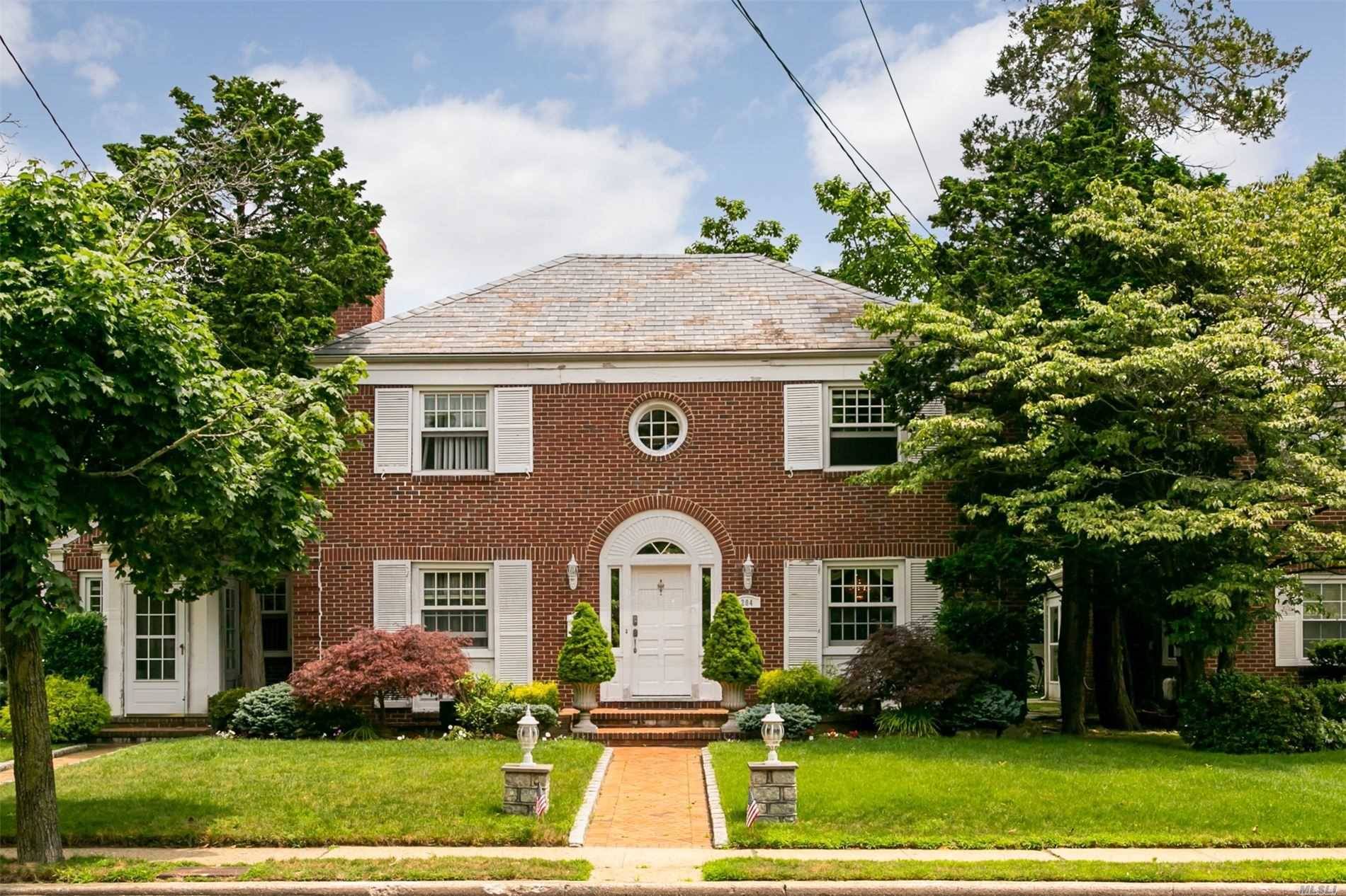 This unique majestic all brick colonial has high end, custom upgrades thru out.