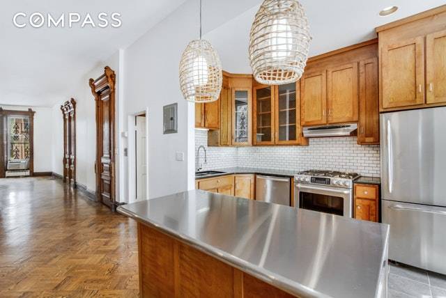 This STUNNING 2 bedroom plus rec room triplex is located in prime north park slope.