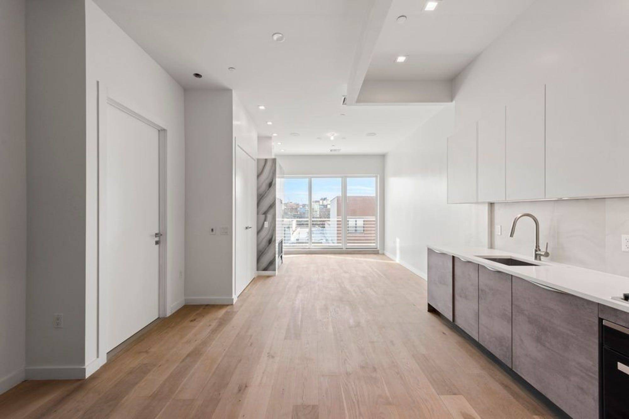 A brand new floor through condo situated a block away from McCarren Park, this contemporary 3 bedroom, 3 bathroom home blends modern fixtures and finishes with private outdoor space.