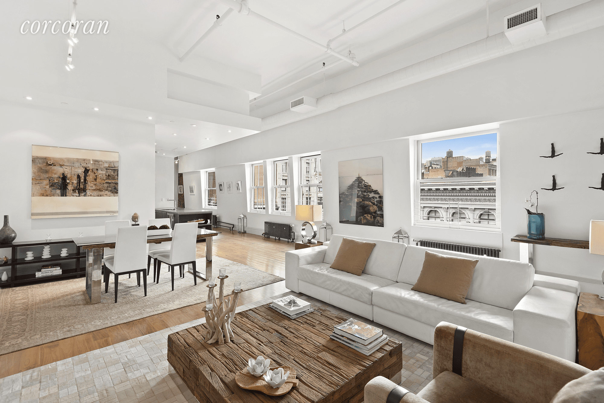 This phenomenal full floor penthouse loft is an oasis of sun filled serenity and airy grand proportions featuring two bedrooms, two baths and a home office in an outstanding SoHo ...