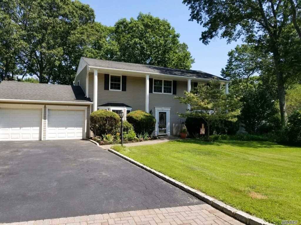 Fabulous 4BR, 2. 5 Bath Colonial with New Heating System, Hot Water Heater, Roof, Vinyl Siding, Windows, More !