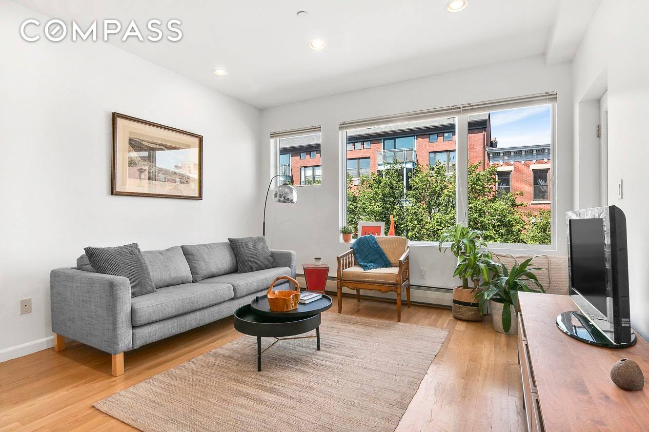 Welcome home to this impeccably maintained floor through Two Bedroom and Two Bathroom Condo in Park Slope that features three private balconies.