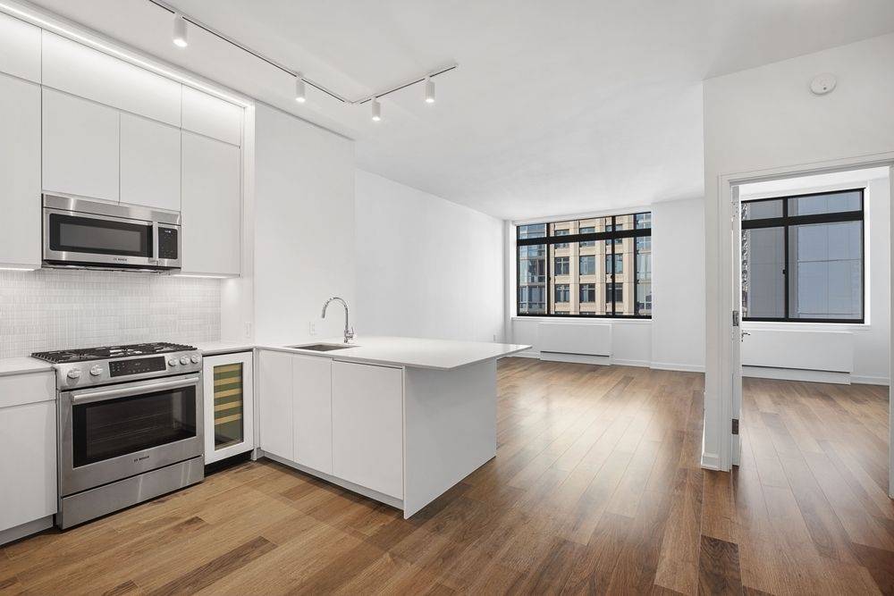 Luxury FlatIron Building Close To All Transportation Features Amenities Such As 24 Hour Concierge, Valet Service, Roof Top Pool, Resident Lounge, Gym, Yoga Room