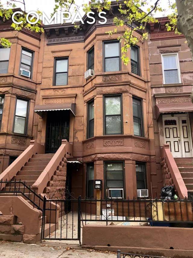 Beautiful and Classy legal two family Brownstone house with 6 bedrooms and 3 bathrooms and a nice backyard.