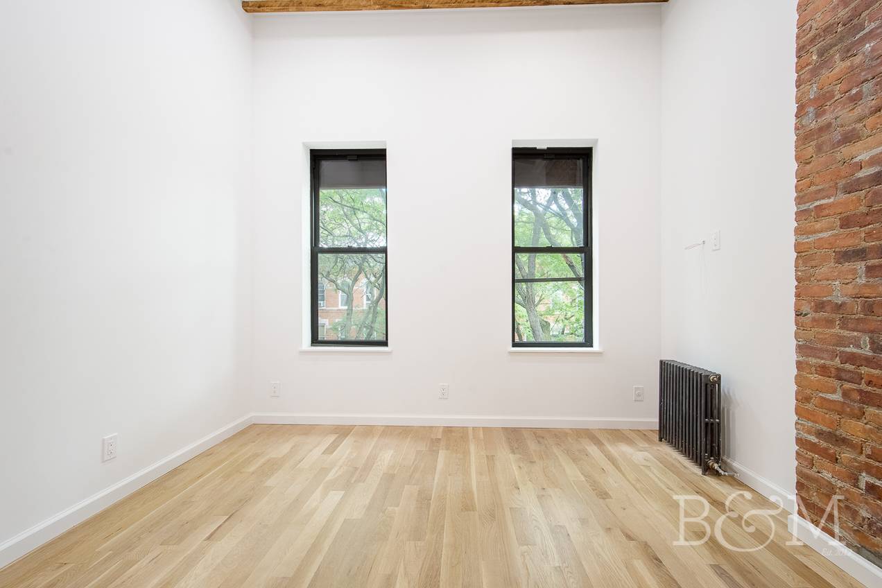 Our Thoughts This renovated two bedroom apartment features condo like finishes.