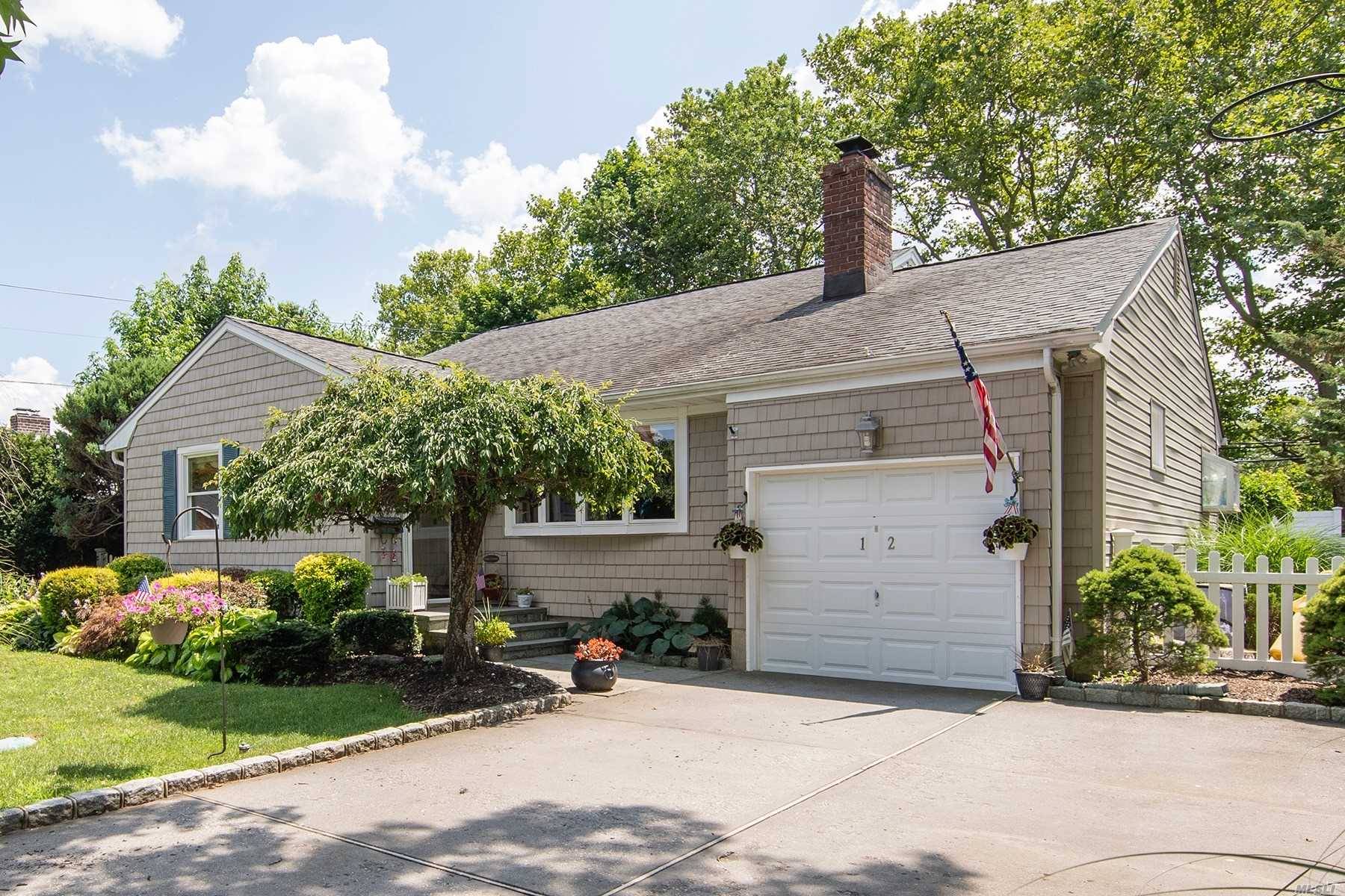 Move Right Into This Mid Block Expanded Ranch In Award Winning Syosset Schools.