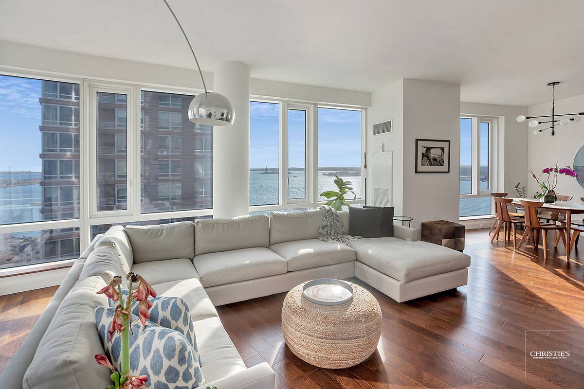 This spacious three bedroom, two and a half bathroom home at the Pelli designed condominium, The Visionaire, has a panoramic curtain of glass windows overlooking sweeping sights of the Hudson ...