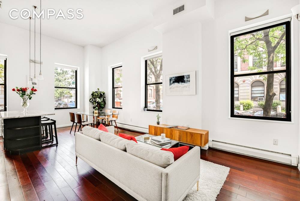 Rare opportunity to own a pre war renovated loft with dramatic 14' high ceilings and huge windows, located in the heart of Greenpoint Williamsburg just 2 blocks from McCarren Park ...