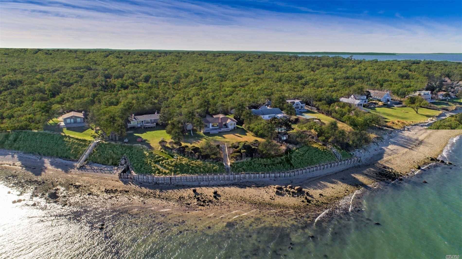 Available for the first time in over three decades, this exclusive, waterfront Kings Point property in East Hampton features views of Gardiner's Bay and Island.