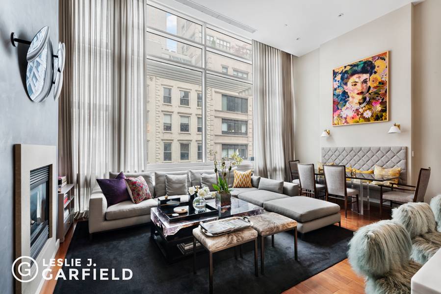 A meticulously renovated duplex apartment with a private keyed elevator in the heart of Tribeca awaits.