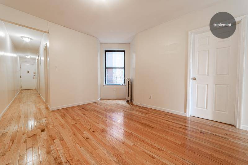 This newly renovated 4 bedroom apartment, with closets in every room, is ready for immediate move in.