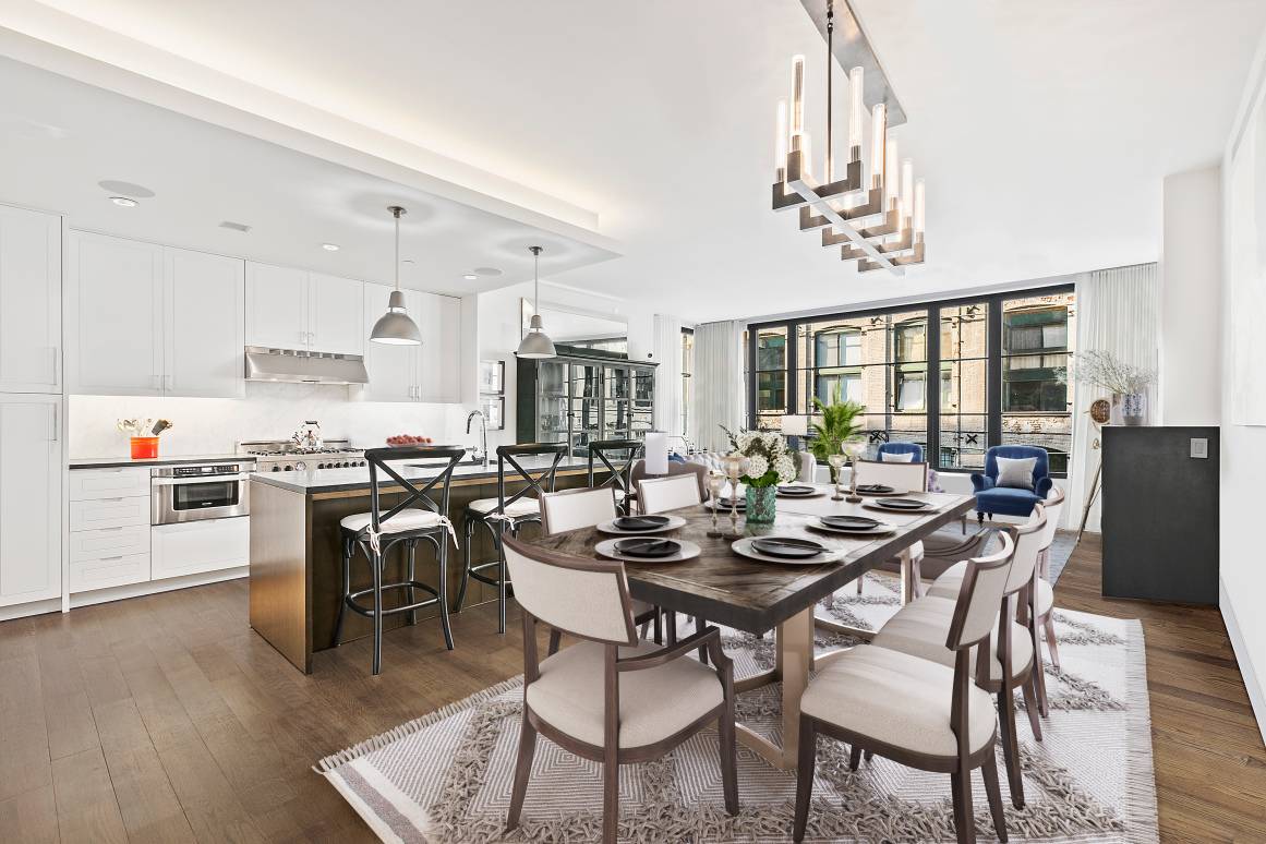 Tucked away amidst the quiet brownstone streets of Carroll Gardens lies this truly special home.