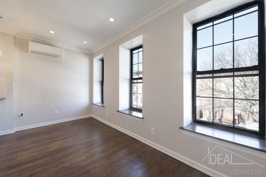 Featuring hardwood floors, contemporary finishes and a spacious roofdeck, this NO FEE Bed Stuy floor thru 2BR is sure to turn heads.