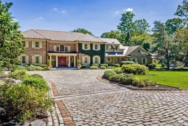 Impressive 5 Bedroom Brick Colonial set on 5 lush acres in the Golden Triangle.