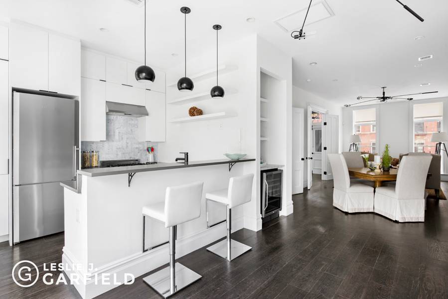 Set in the heart of Park Slope, only steps from 5th Avenue's finest shops and restaurants, this charming townhome has been completely rebuilt inside and out.
