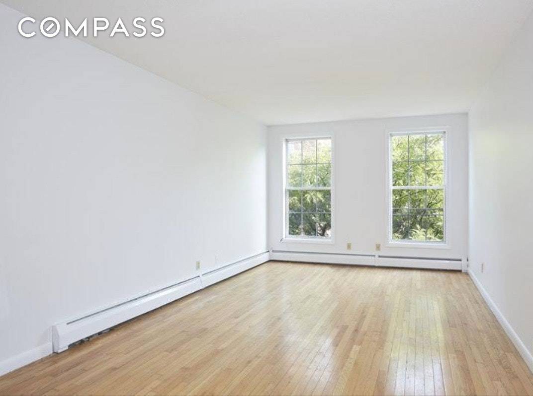 Real three bedroom with great light and a wonderful view of lower Manhattan's skyline from the living room.