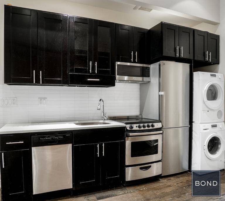Welcome home. Luxury Awaits you MASSIVE PRIVATE DECK and Washer Dryer In Unit Prime Greenwich Village Location.