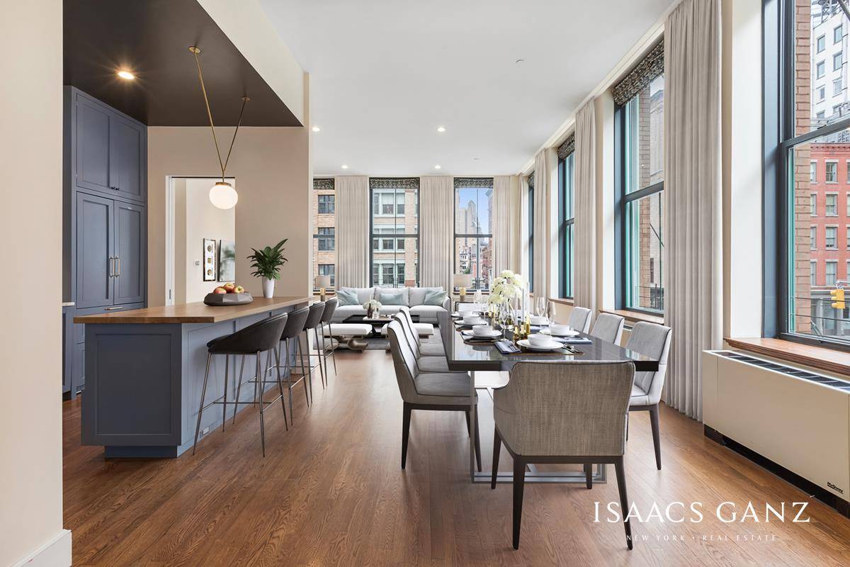 Featured in LUXE MAGAZINE, this thoughtfully renovated corner loft has it all.