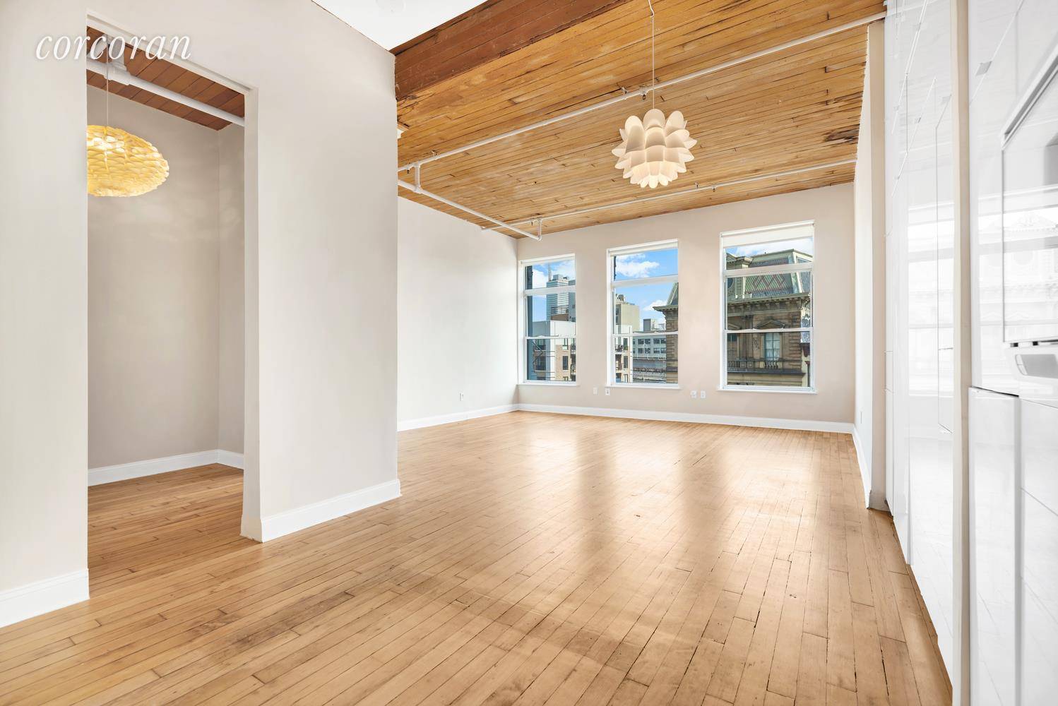 LEASES OUT NO LONGER SHOWING Bask in stunning views and grand proportions in this gorgeous loft home in a rare Williamsburg cast iron building.