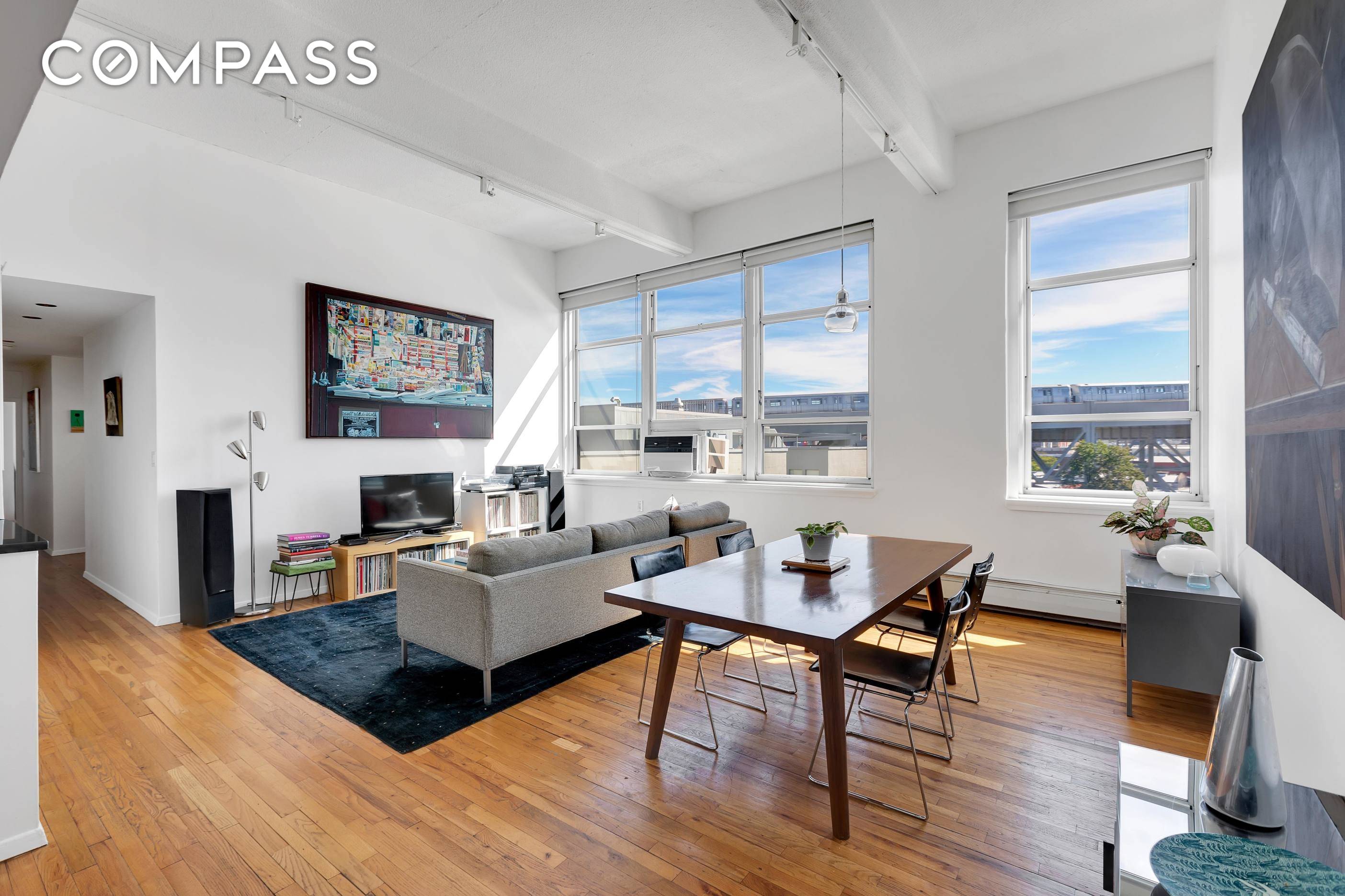 Welcome to this grand sun drenched 3 bedroom, 2 bath condo at Court Street Lofts in the heart of Carroll Gardens.