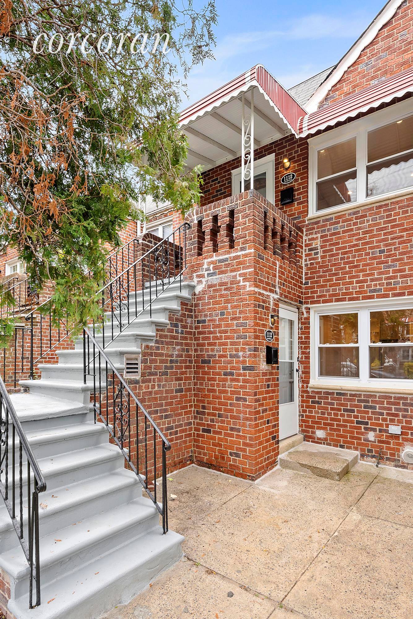 This 2 family stunner brick beauty checks all the boxes !