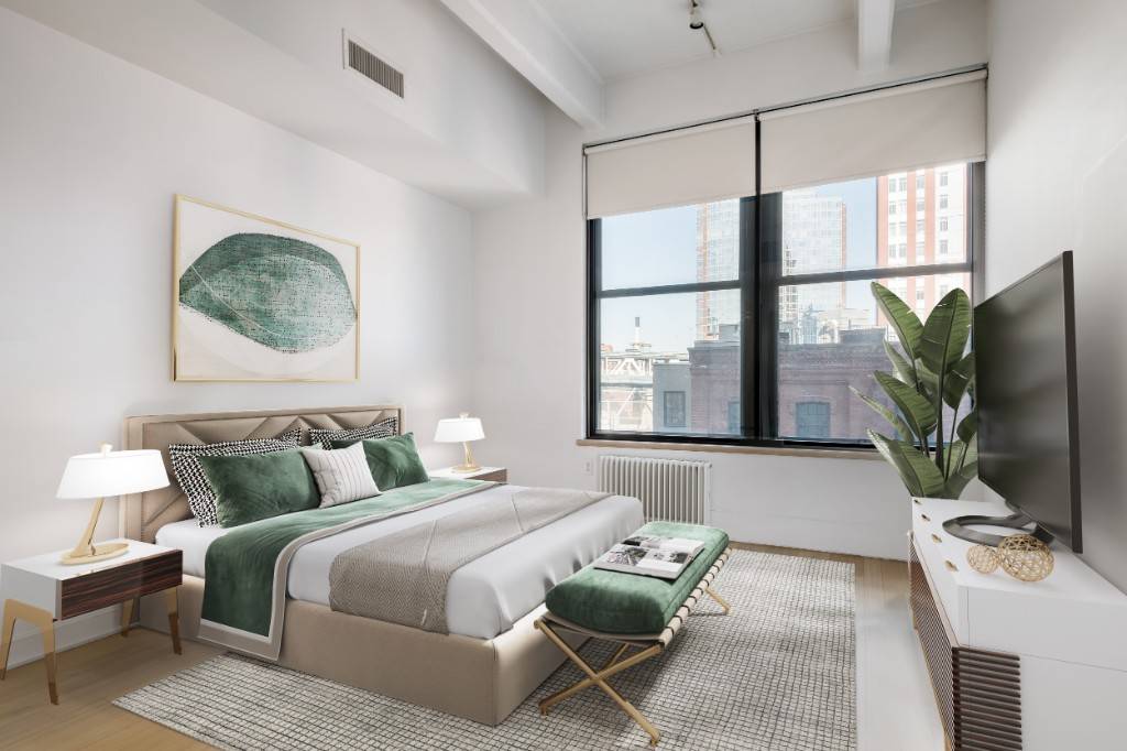 This lovely loft apartment offers 1, 236sf of bright space with oversized windows, 11' high concrete beamed ceilings and bamboo flooring throughout.