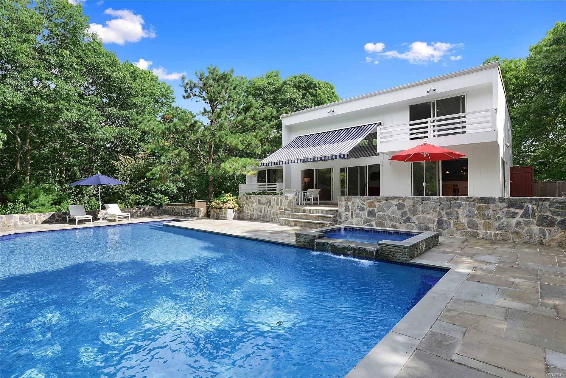 Designed by Myron Shulman, this pristine contemporary home is definitely one of a kind.