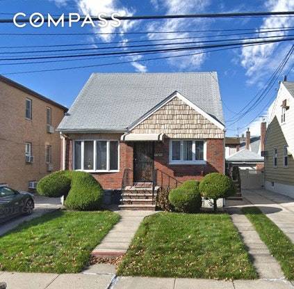 2 family brick home for sale in the heart of Whitestone.