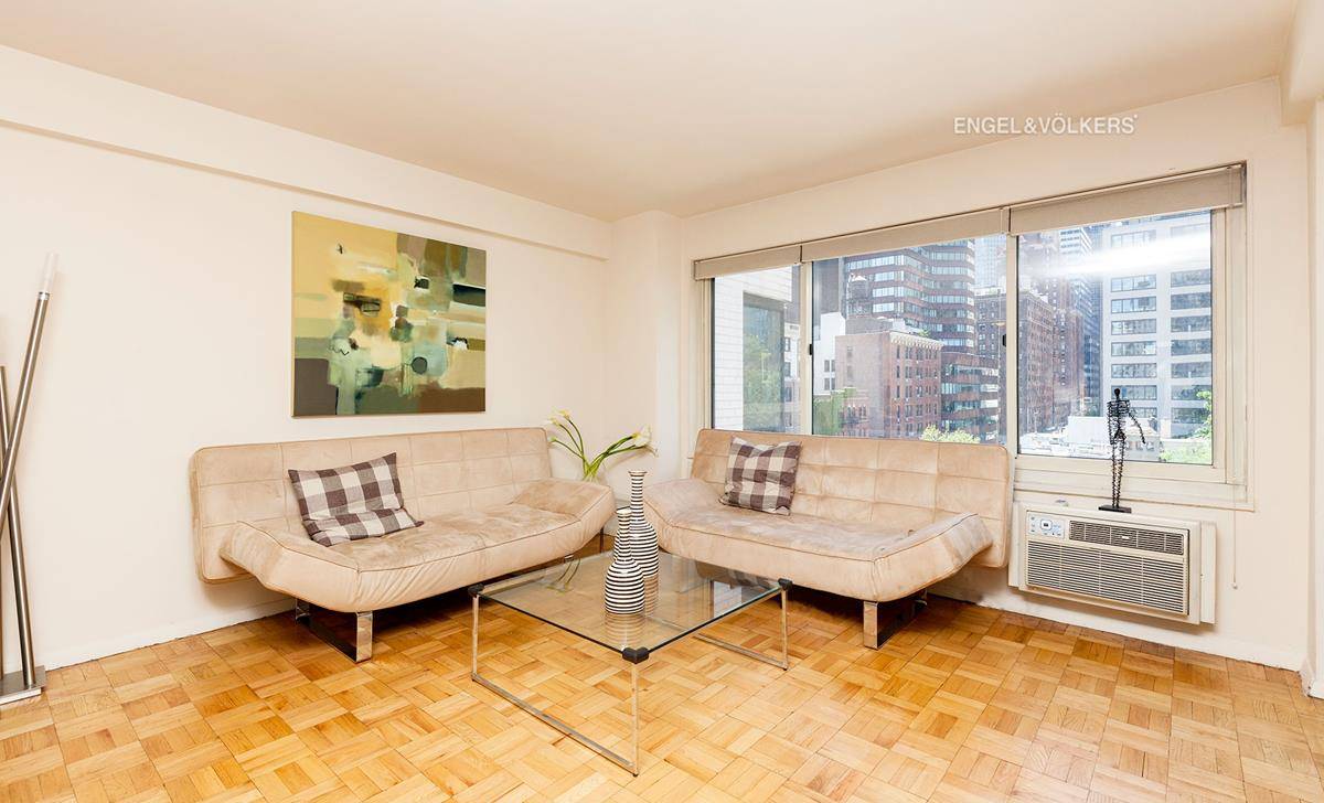 Spacious, sunny, charming, quiet Large Alcove Condo with excellent light and over sized windows overlooking Turtle Bay Garden in a 24 hours doorman building.