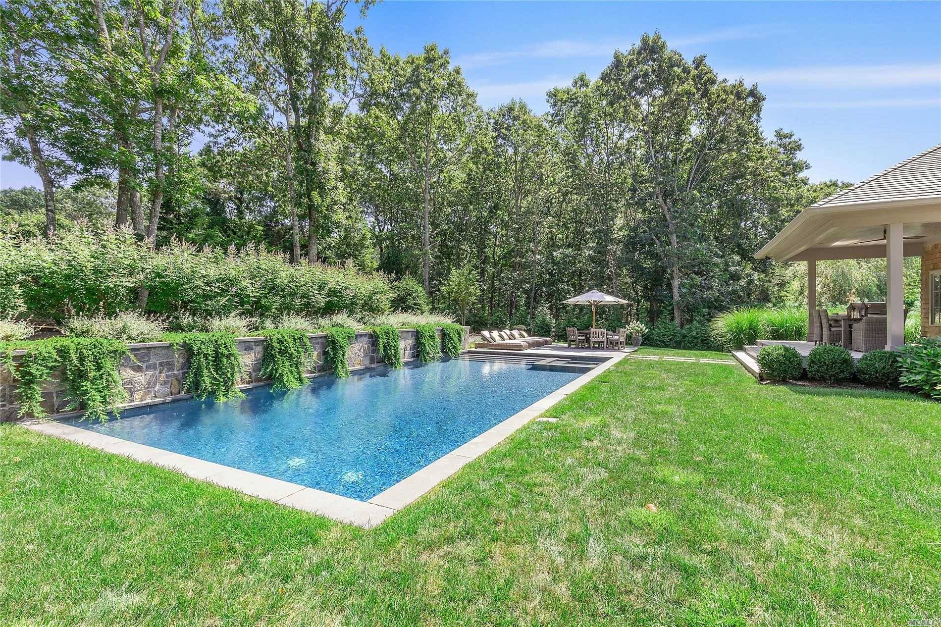 Custom built, top of the line amenities, private stone driveway.