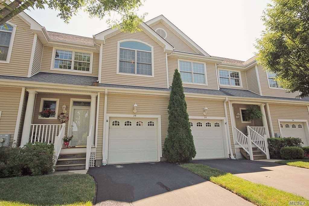 Stunning model with open concept great room, high ceilings, updated master bath and kitchen, 2 walk in closets in master suite, attached garage, private deck facing woods.
